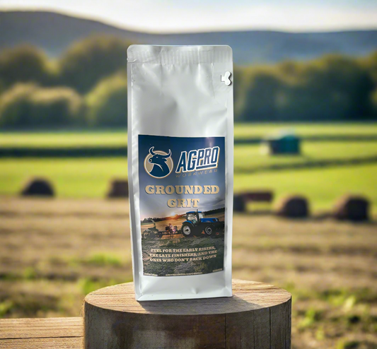 AG Pro Grounded Gut supplement package on a wooden stump with a blurred field and trees in the background